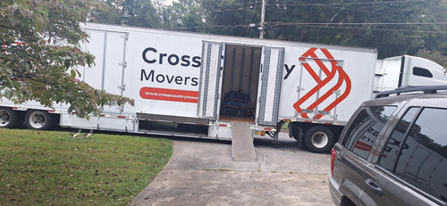 Cross Country Movers truck being loaded for a move