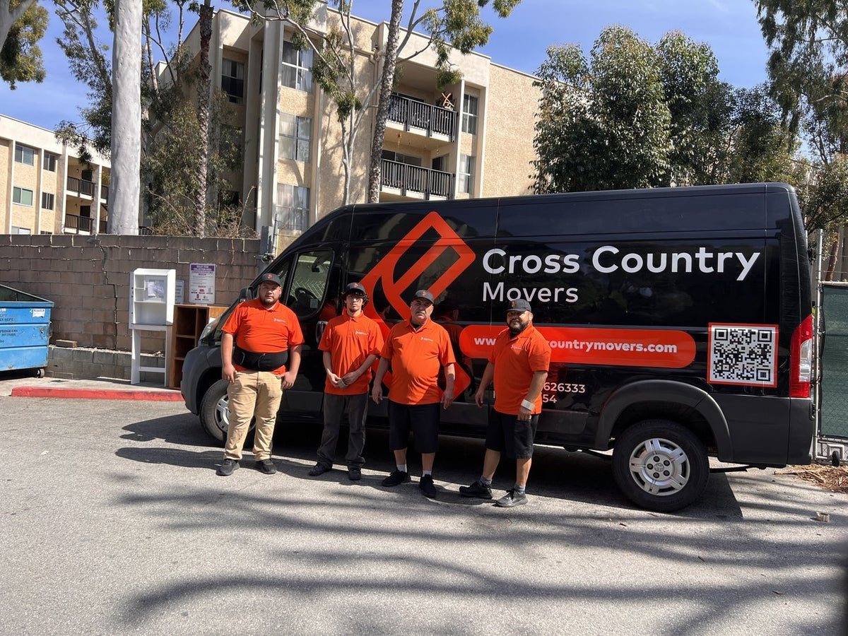 Cross Country Movers team with a moving van